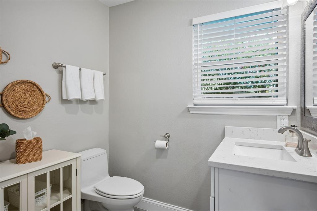 Half bath located just off the second living area.