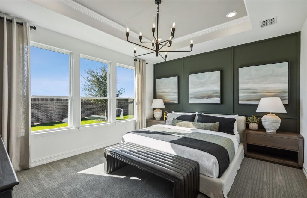 *Model Representation - Spacious owner's suite with private bath