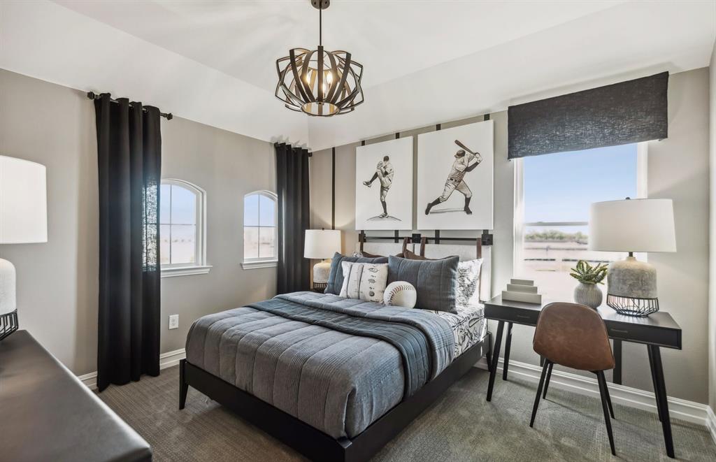 *Model Representation - Spacious secondary bedroom with large windows