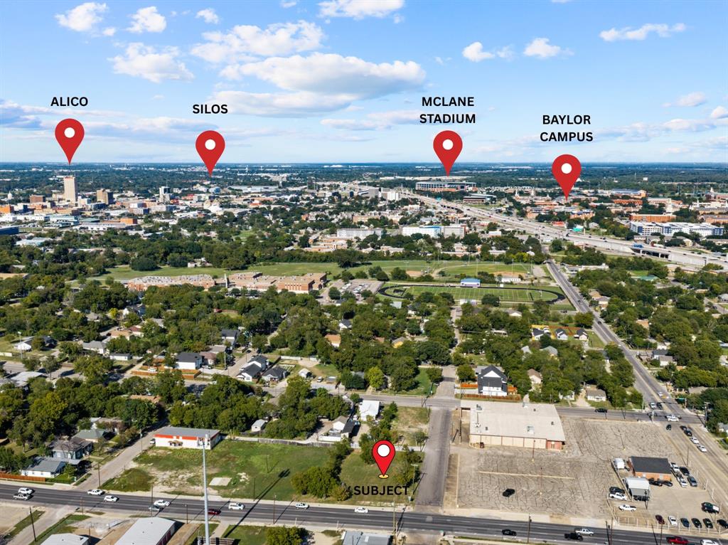 Aerial perspective of the subject property featuring proximity to regional landmarks including McLane Stadium, the Baylor University campus, the Silos, and the Alico building