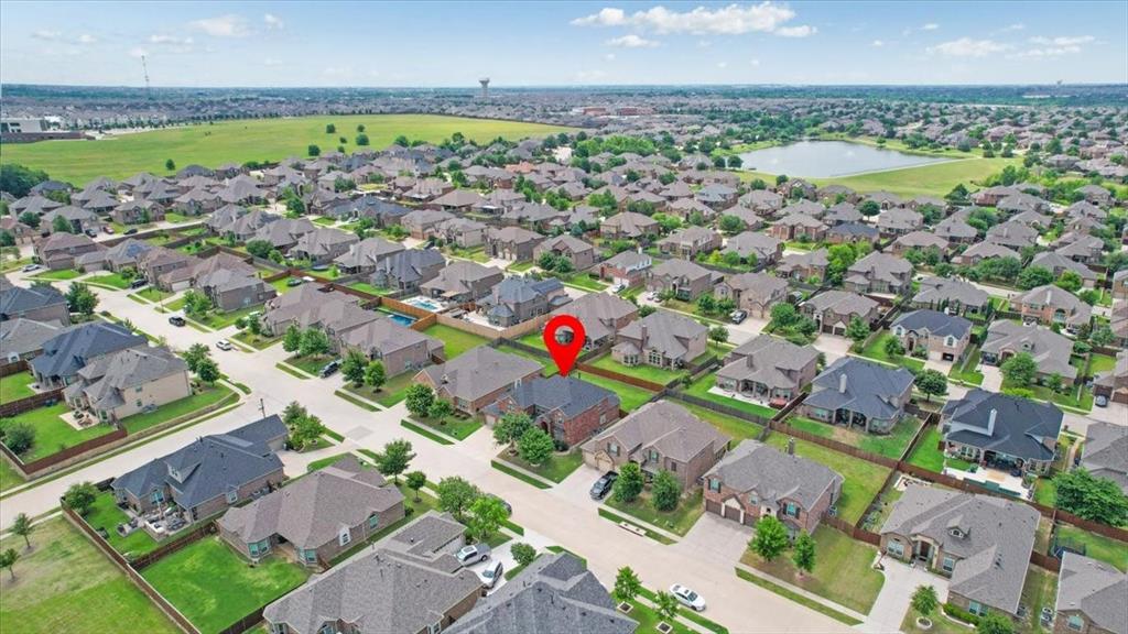 Suburban neighborhood featuring varied architectural styles and mature landscaping