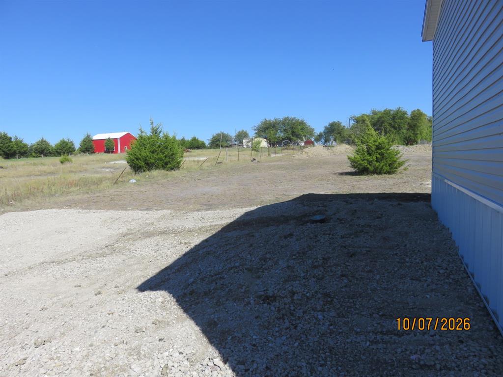side yard with extra parking