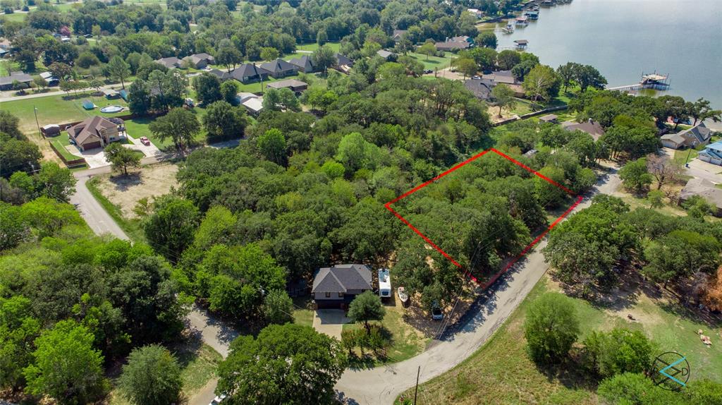 Birds eye view of property with a water view Birds eye view of property with a water view
