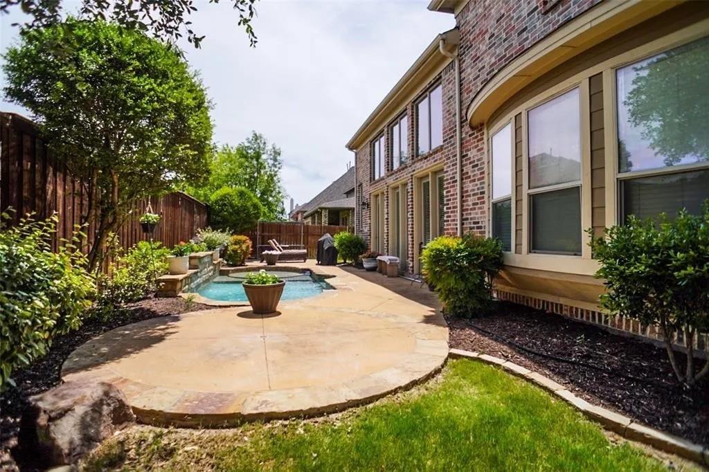 SIDE VIEW OF BACKYARD!