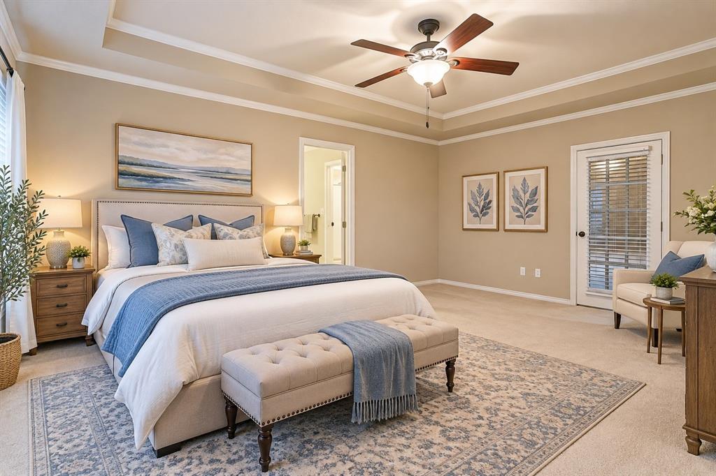 Primary bedroom is spacious with door to a living area, ensuite bath, stepped ceiling - virtual staging