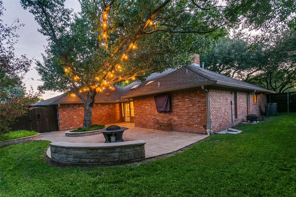 Another view of backyard and patio and yard on right side