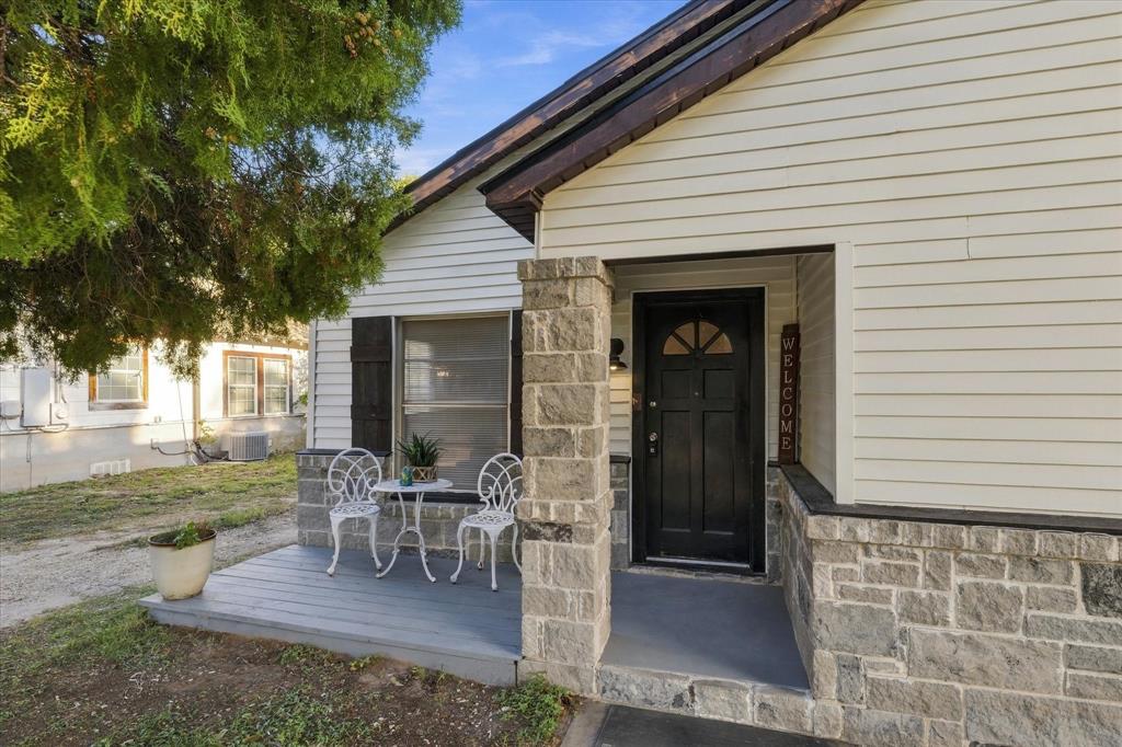 Closeup of front exterior and patio with Unit A entrance