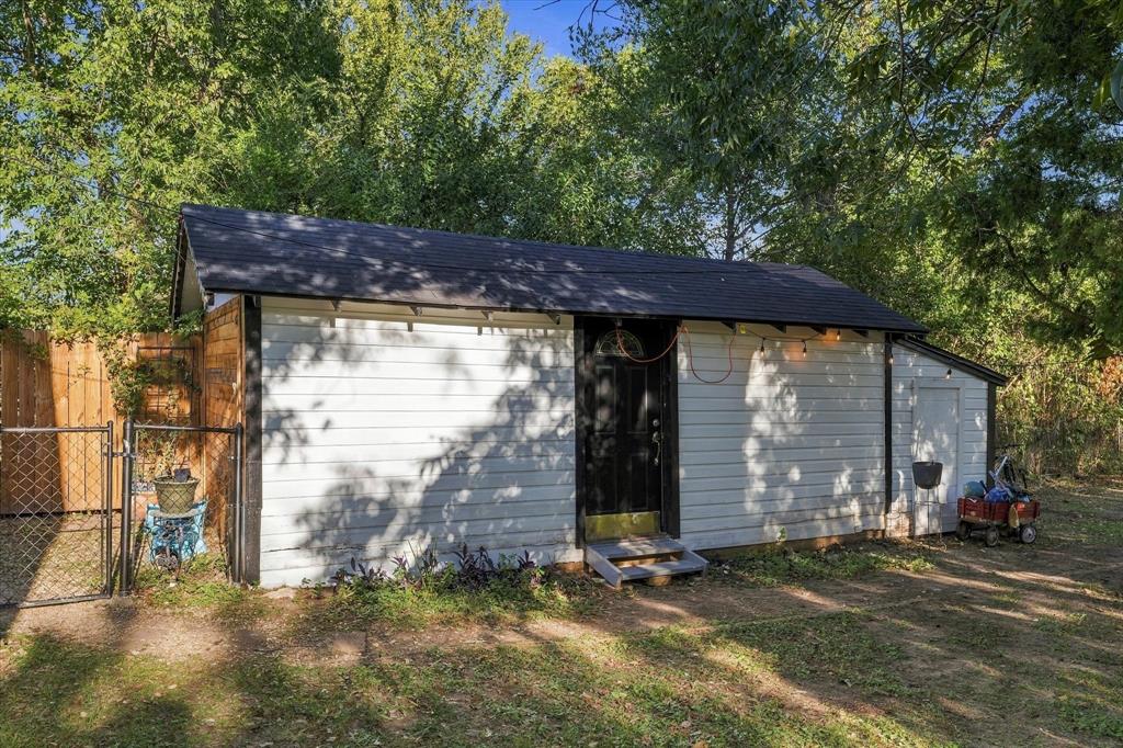 Detached garage that has been partially converted to guesthouse