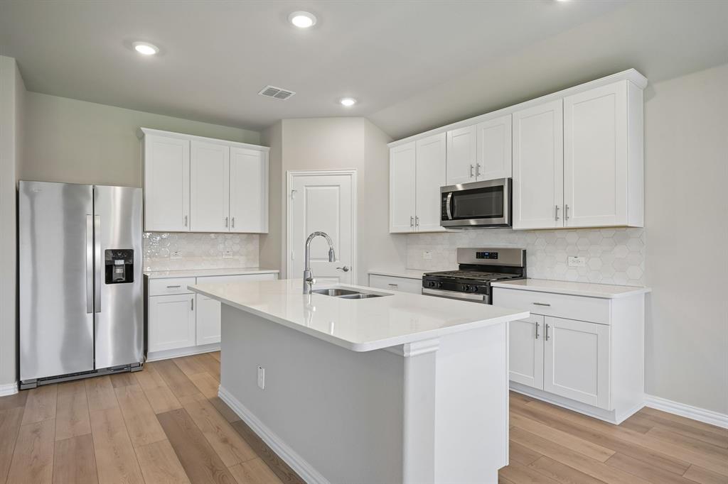 Photo is not of the actual home, but is an inspirational photo of builder’s model home and may depict options, furnishings, and/or decorator features that are not included.