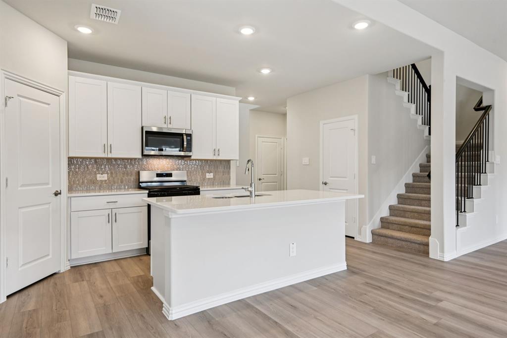 Photo is not of the actual home, but is an inspirational photo of builder’s model home and may depict options, furnishings, and/or decorator features that are not included.