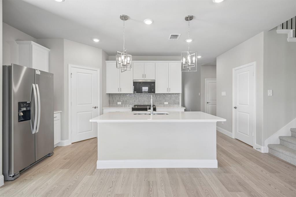 Photo is not of the actual home, but is an inspirational photo of builder’s model home and may depict options, furnishings, and/or decorator features that are not included.
