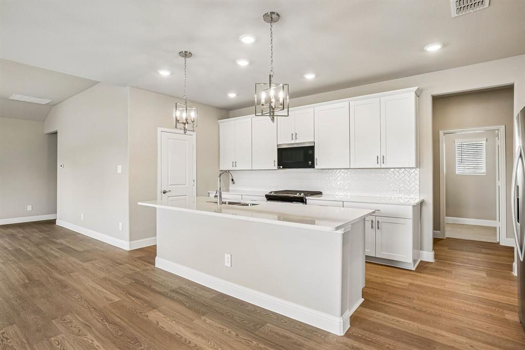 Photo is not of the actual home, but is an inspirational photo of builder’s model home and may depict options, furnishings, and/or decorator features that are not included.