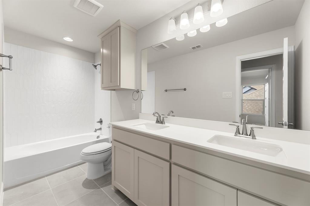 23_24. 3907 Lochwood - 3RD Bath.jpg