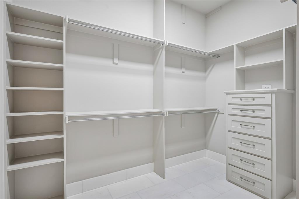First primary closet with plenty of built-ins