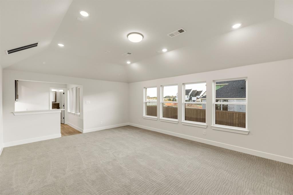 upstairs Media room with a full wet bar and a powder bathroom