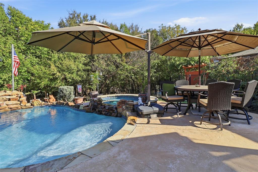 Incredible pool/spa deck provides for family and entertaining summertime fun.