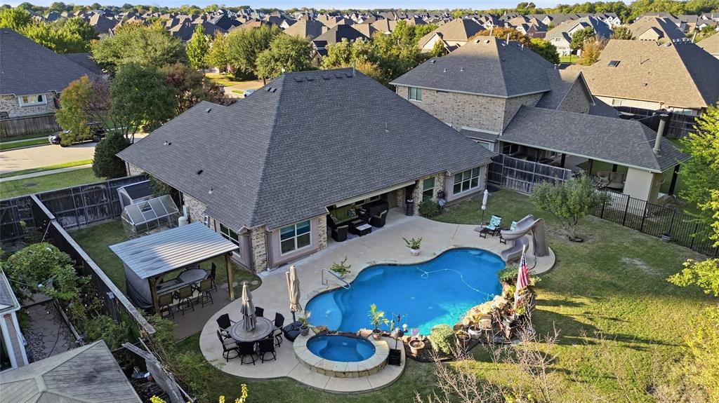 Outdoor kitchen, large covered patio, Pool, spa and large grass area