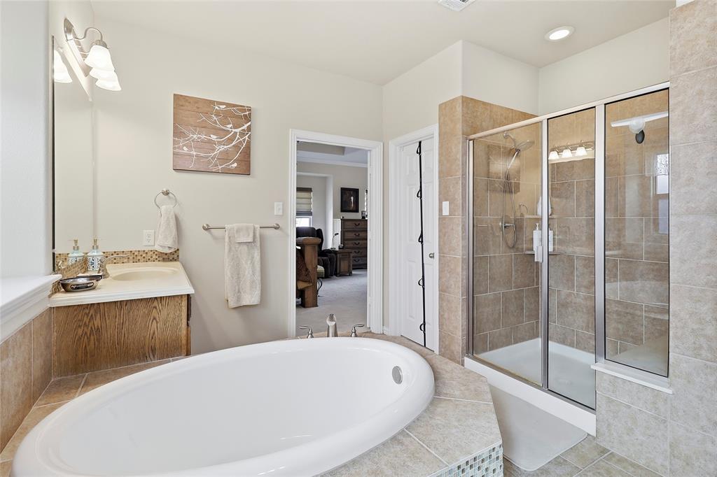 Expansive Primary Bath's oversized walk-in shower