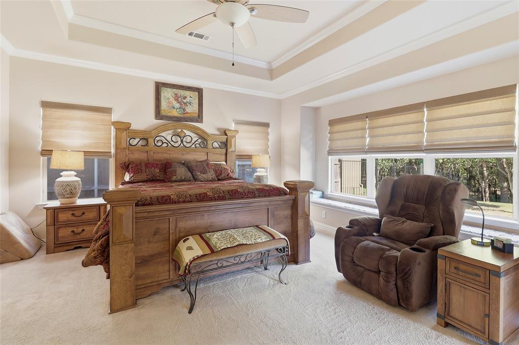Primary Bedroom with view to pool