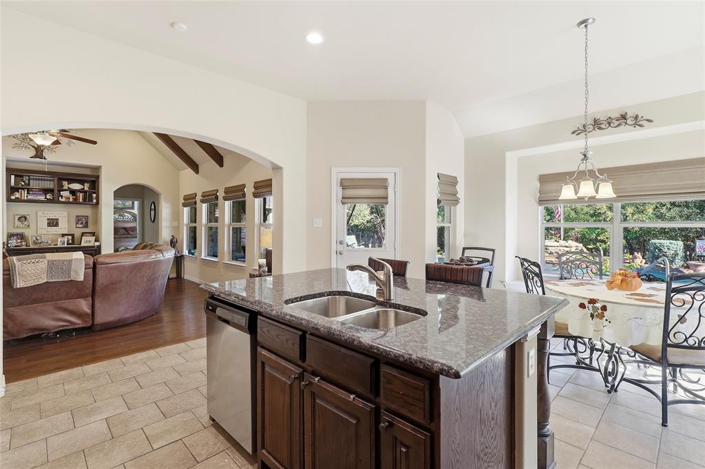 Breakfast island granite counter tops and stainless appliances