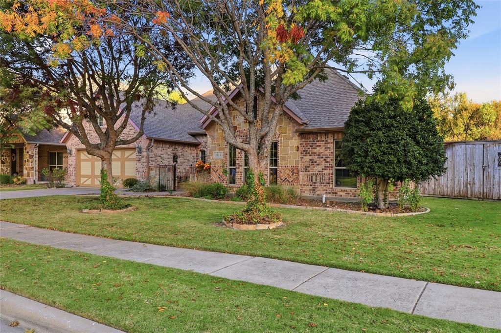 Front yard with beautiful mature trees and large sideyard