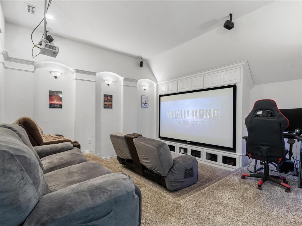 Experience endless nights of cinematic bliss in our state-of-the-art media room, equipped with a 4K projector, 7.1 surround sound, and plush lounge chairs.