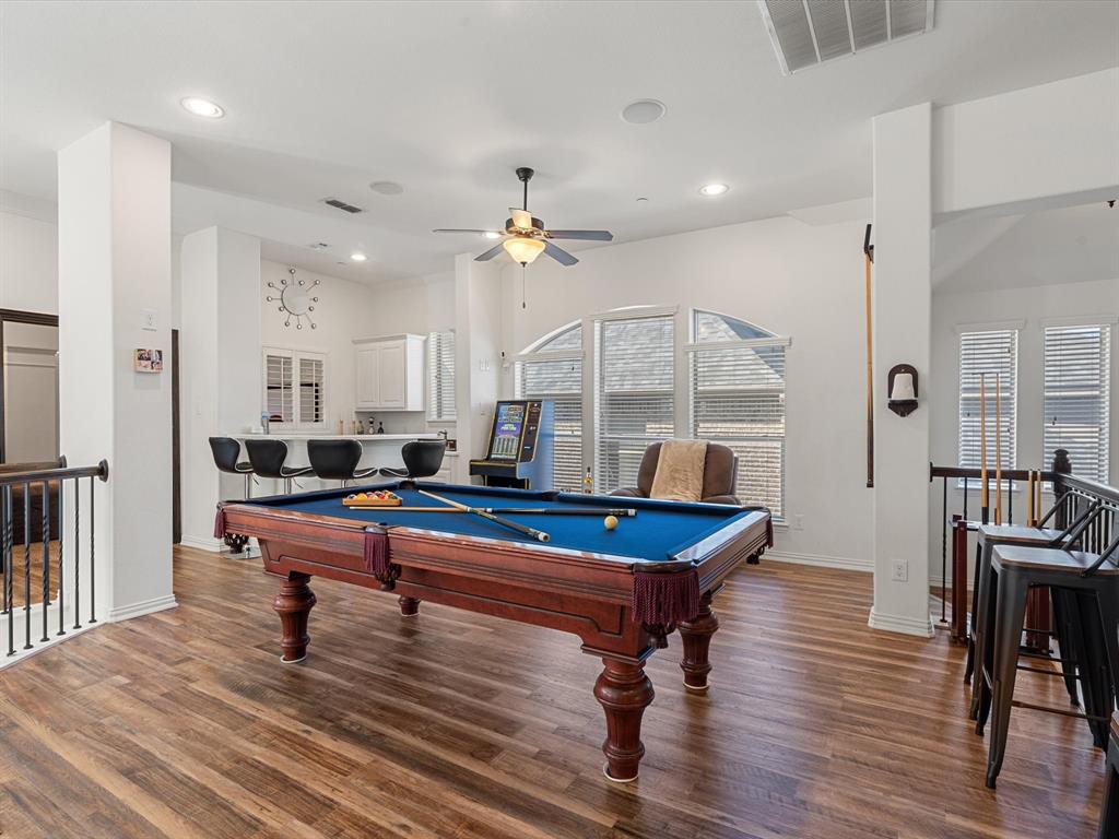 Rec room featuring dark wood-type flooring, billiards, a ceiling fan, and recessed lighting
