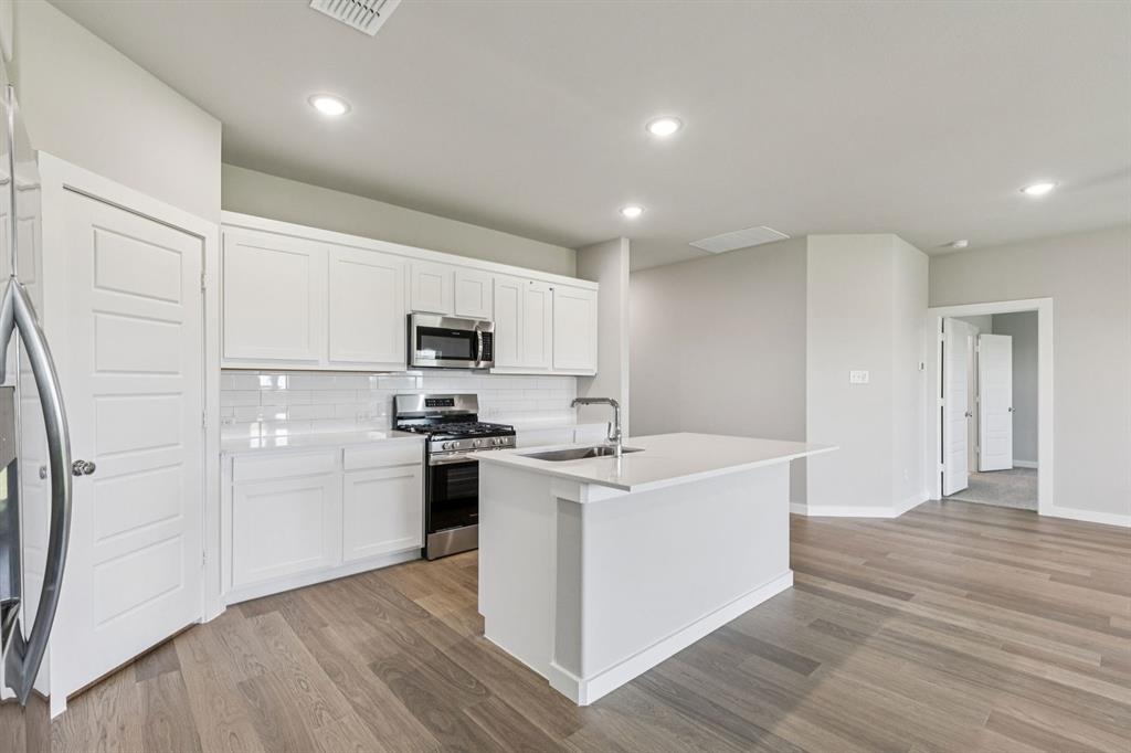 Kitchen in the Harper home plan – REPRESENTATIVE PHOTO Kitchen in the Harper home plan – REPRESENTATIVE PHOTO