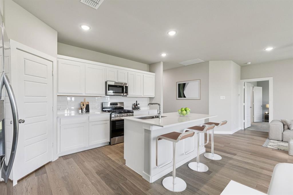 Kitchen in the Harper home plan – REPRESENTATIVE PHOTO Kitchen in the Harper home plan – REPRESENTATIVE PHOTO