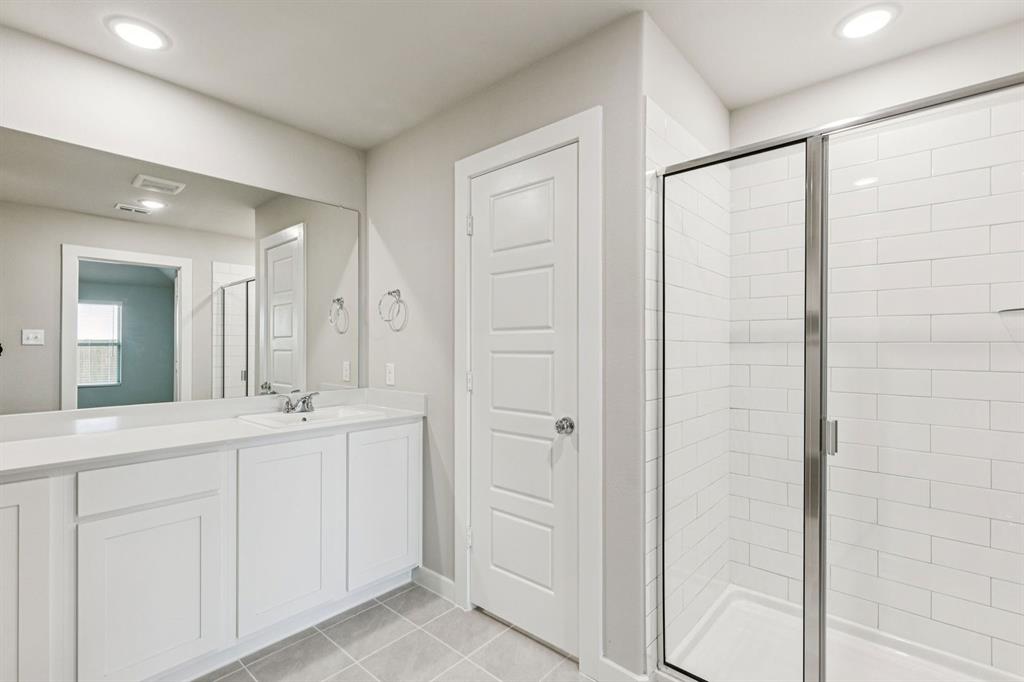 Primary Bathroom in the Harper home plan – REPRESENTATIVE PHOTO