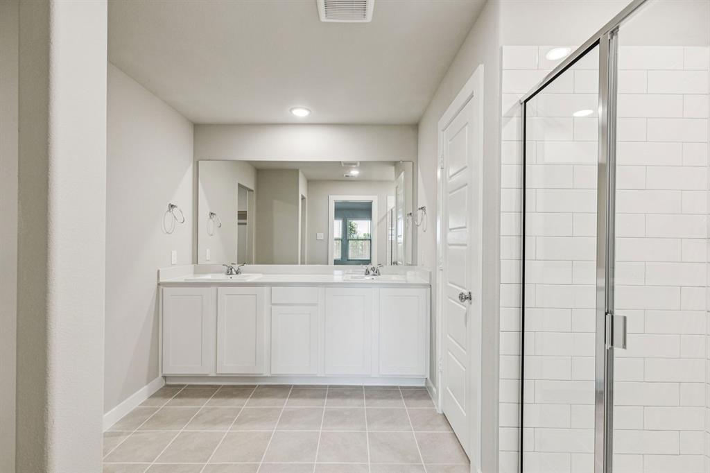 Primary Bathroom in the Harper home plan – REPRESENTATIVE PHOTO