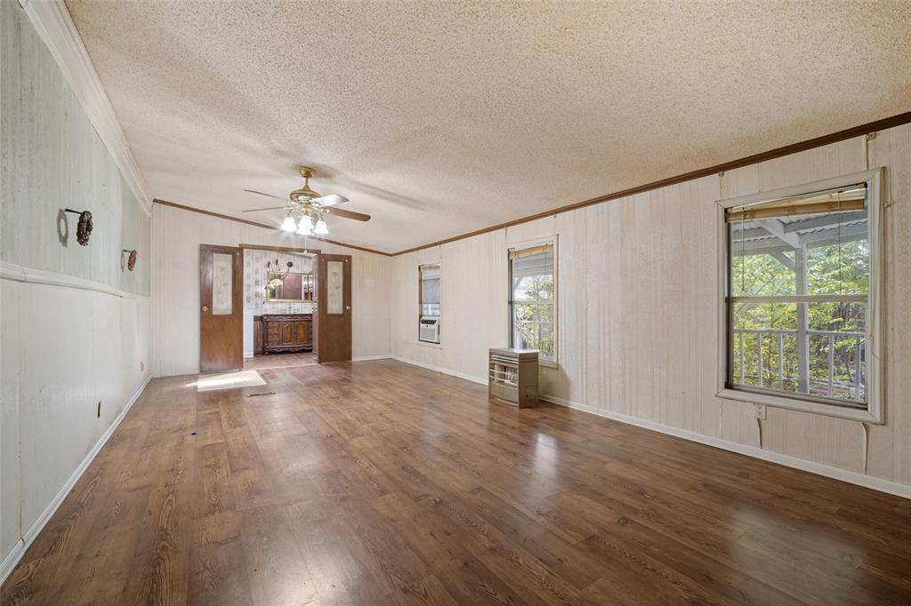 Primary bedroom looking to primary bath