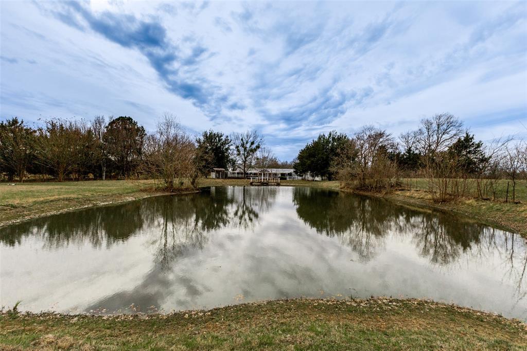 Pond located in front of home Pond located in front of home