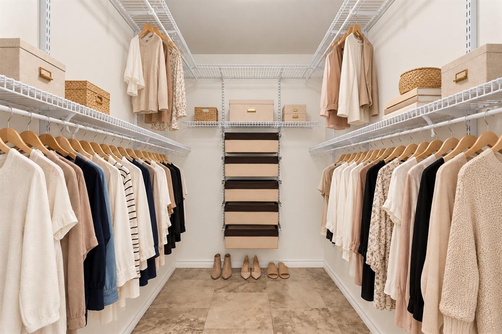 Virtually Staged Primary walk-in closet