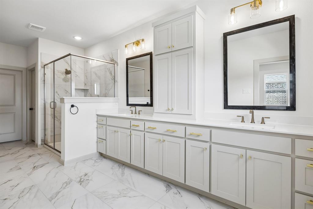 Filled with style, sophistication and space, this fantastic Owner's bath was built for two!