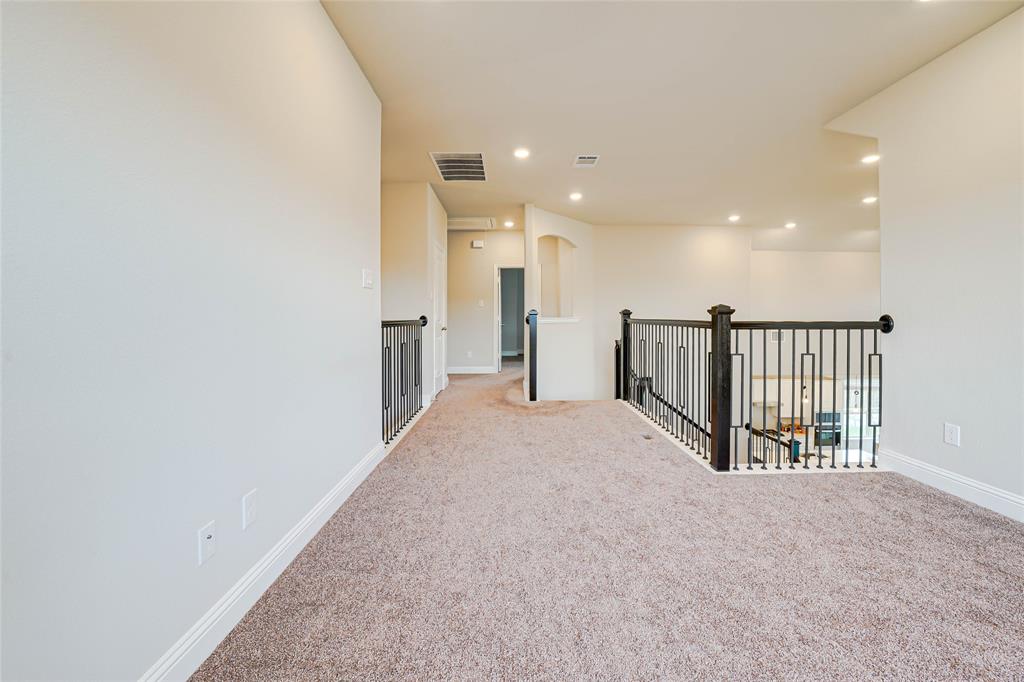 Unfurnished room with carpet flooring and recessed lighting