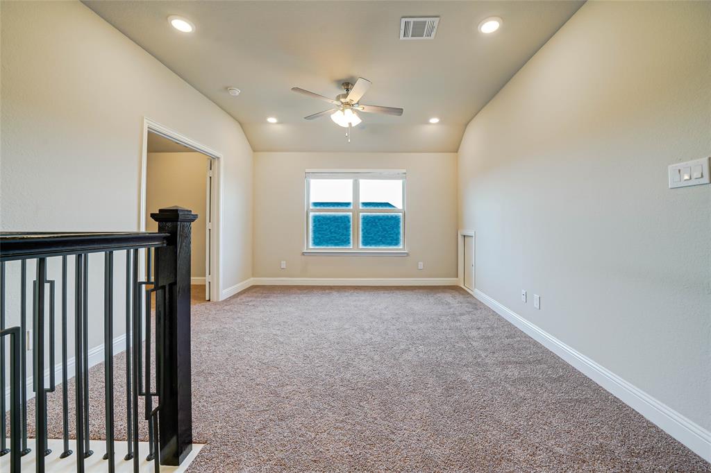 Empty room with light carpet, vaulted ceiling, recessed lighting, and ceiling fan