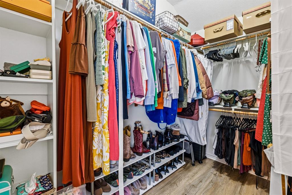 Primary closet located in the primary bath