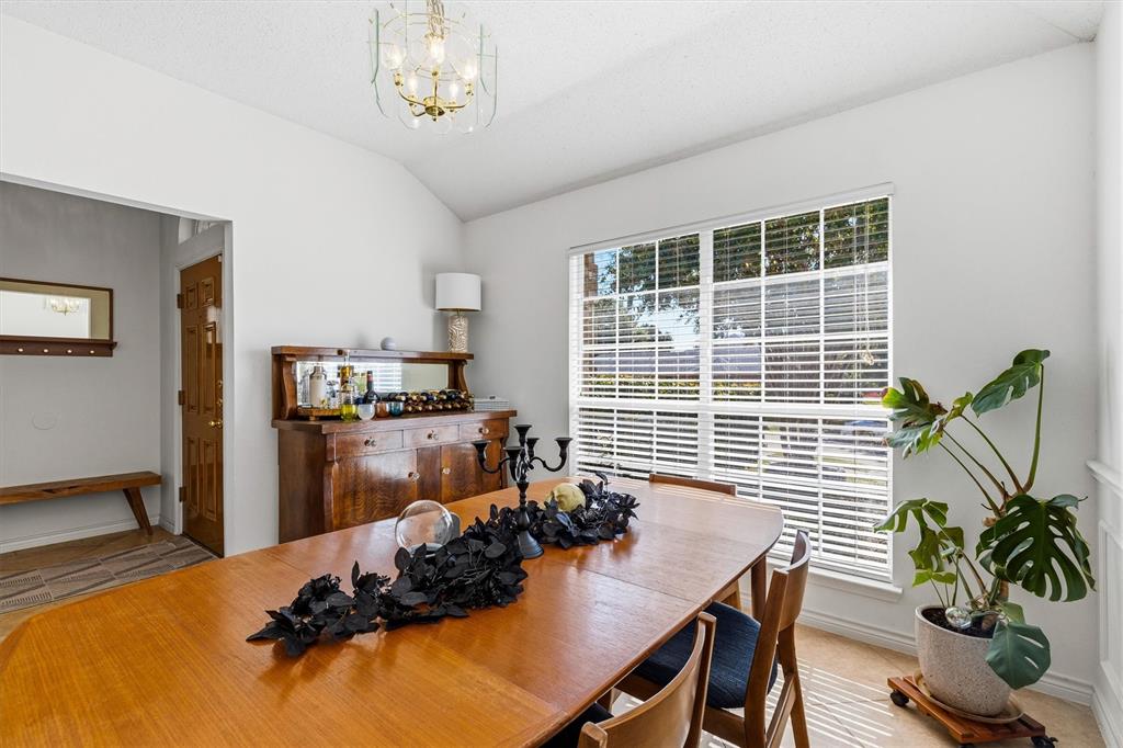 This is a view looking out of the dining room into the entry way