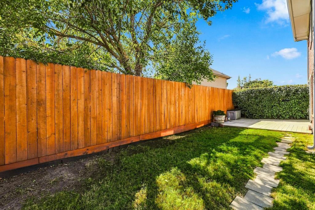 Backyard featuring a stained wood.