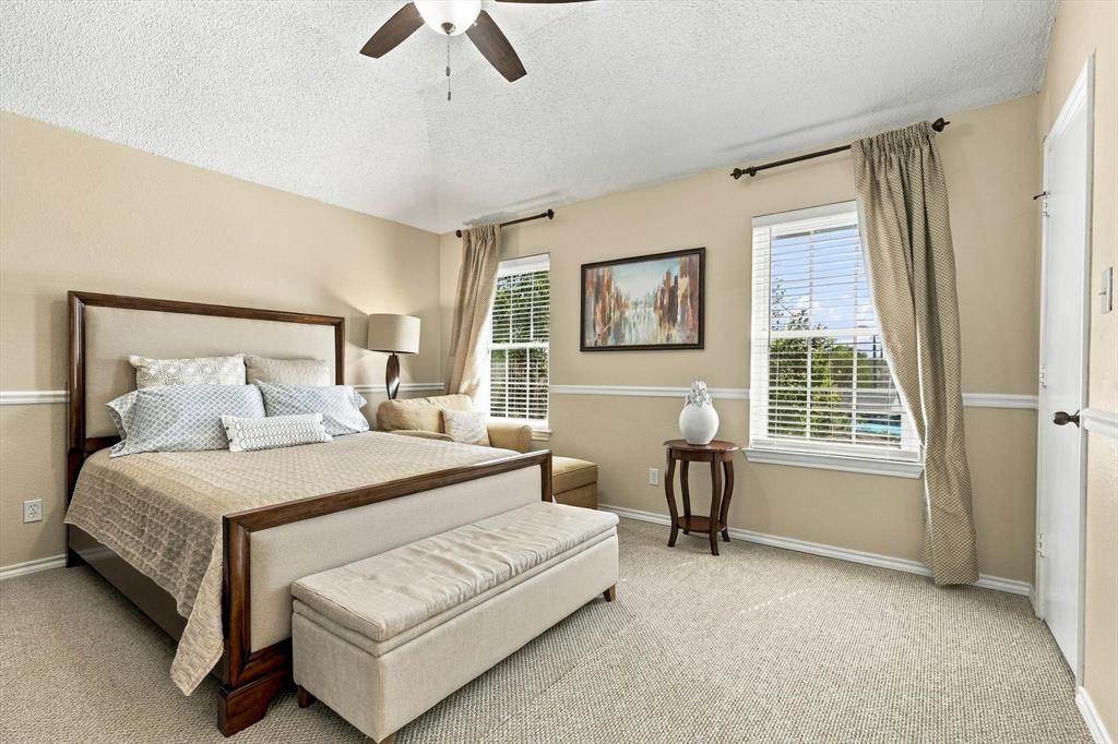 Primary bedroom is spacious, light, and bright.