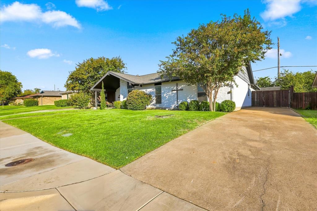 Access the garage in the back of the house from the long driveway on the side of the house