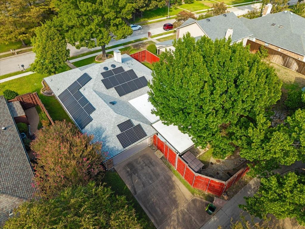 This shows the location of the solar panels that are fully paid and convey to the new owner = hip roof and flat roof