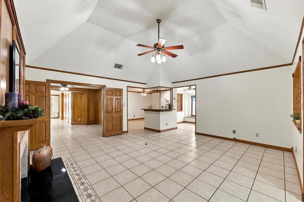 Great view with the Open Concept - slightly vaulted ceiling with ceiling fan - all with walls painted 10-2026Notice the doors to the office. Electric outlet in the floor Great view with the Open Concept - slightly vaulted ceiling with ceiling fan - all with walls painted 10-2026Notice the doors to the office. Electric outlet in the floor