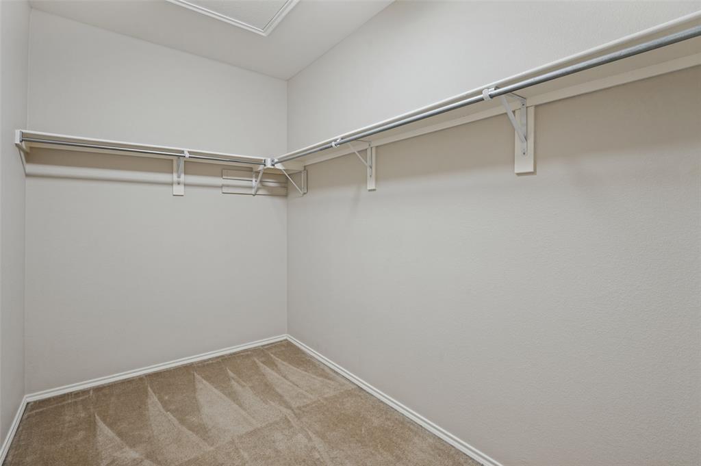 Primary bedroom large walk in closet