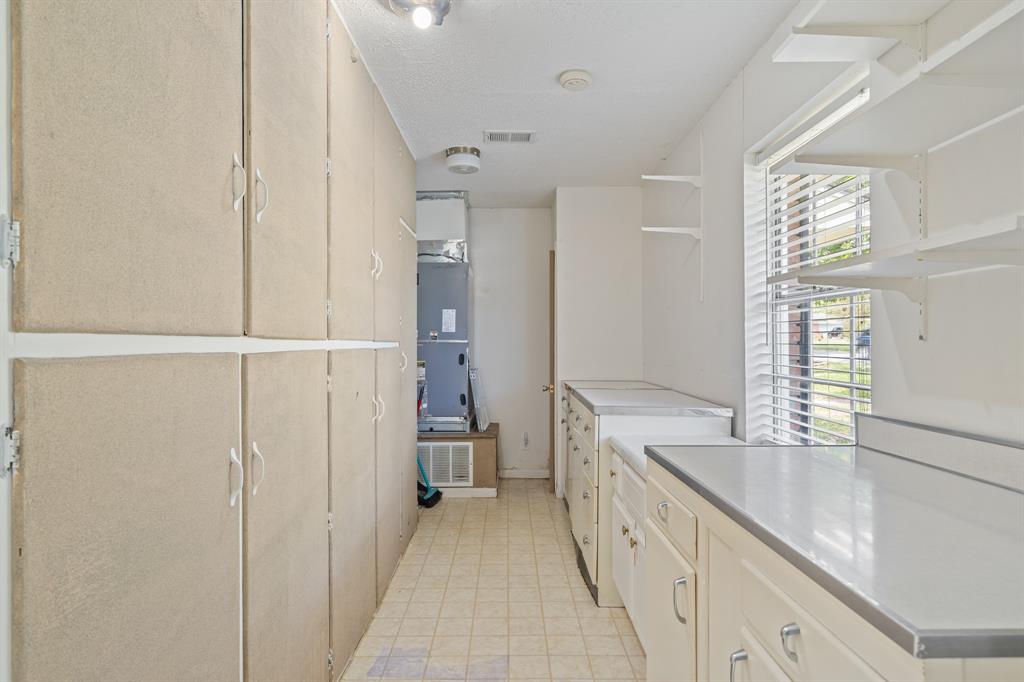 Did I mention the storage behind the kitchen?!?