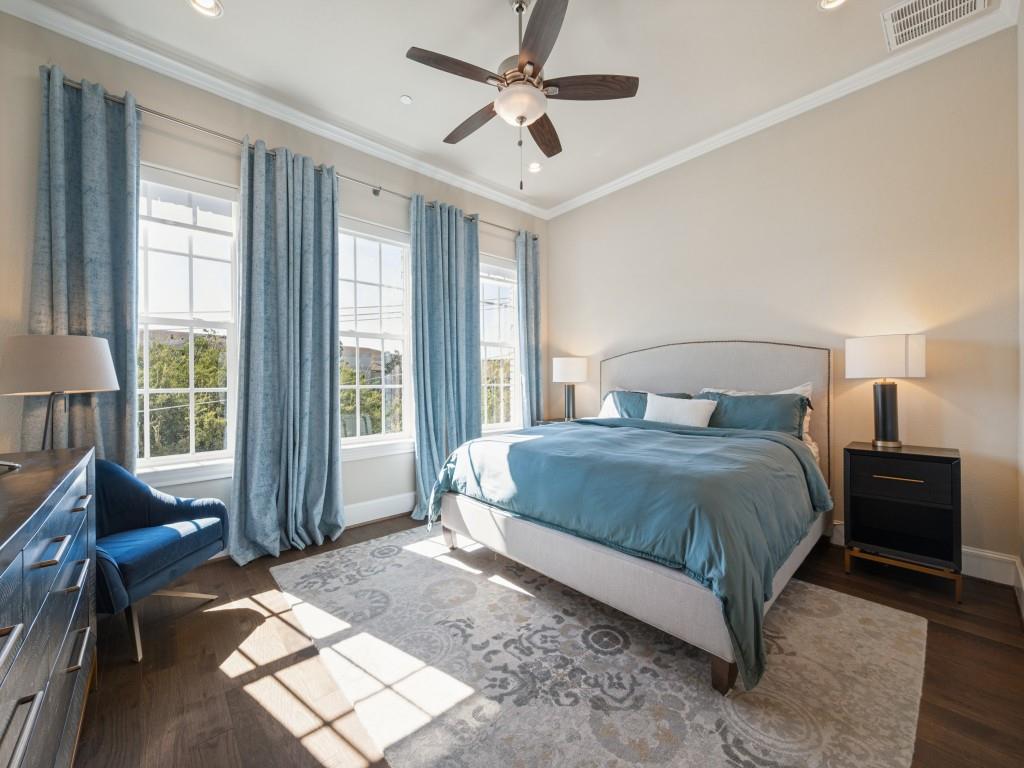 Light Spills in Through the Windows into the Primary Bedroom Creating A Special, Peaceful Space to Relax.