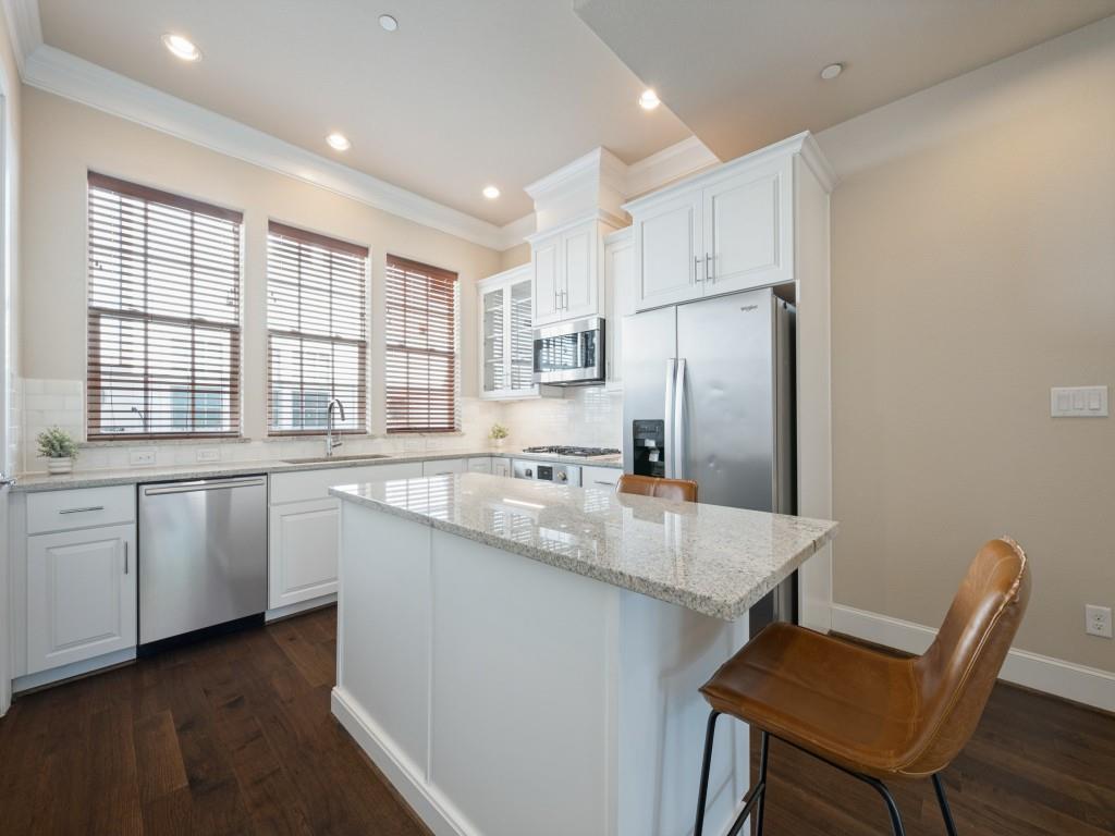 The Gourmet Kitchen Features Bosch Appliances, Granite Counters, and Shaker Style Cabinets, Along with a Walk-in Pantry
