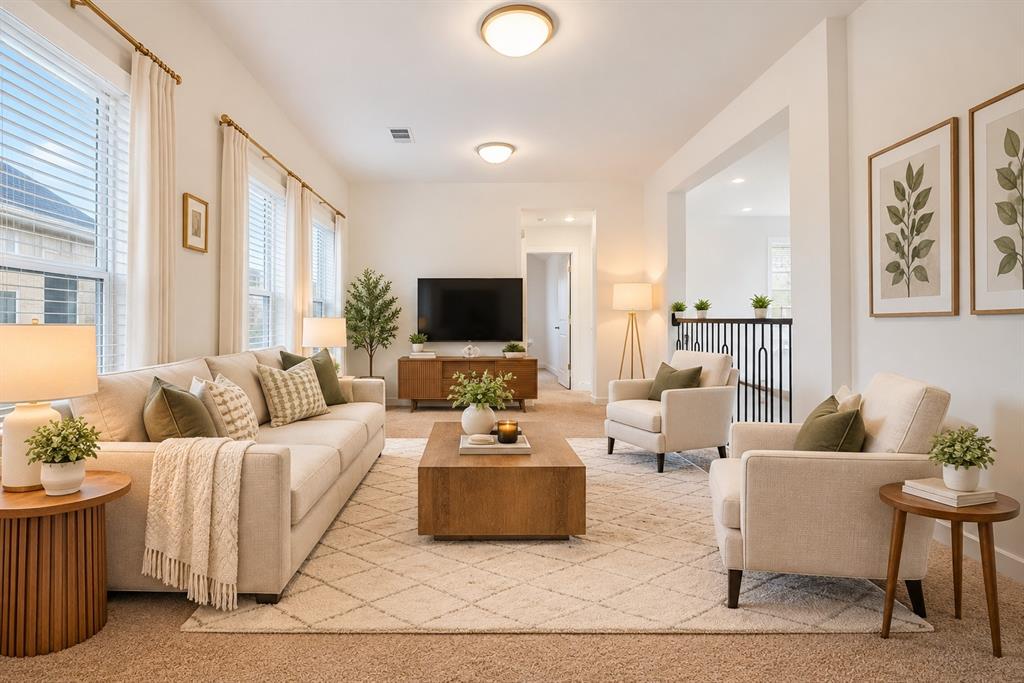 Spacious open-concept upstairs game room, perfect for entertaining, a media room, or additional living space.
