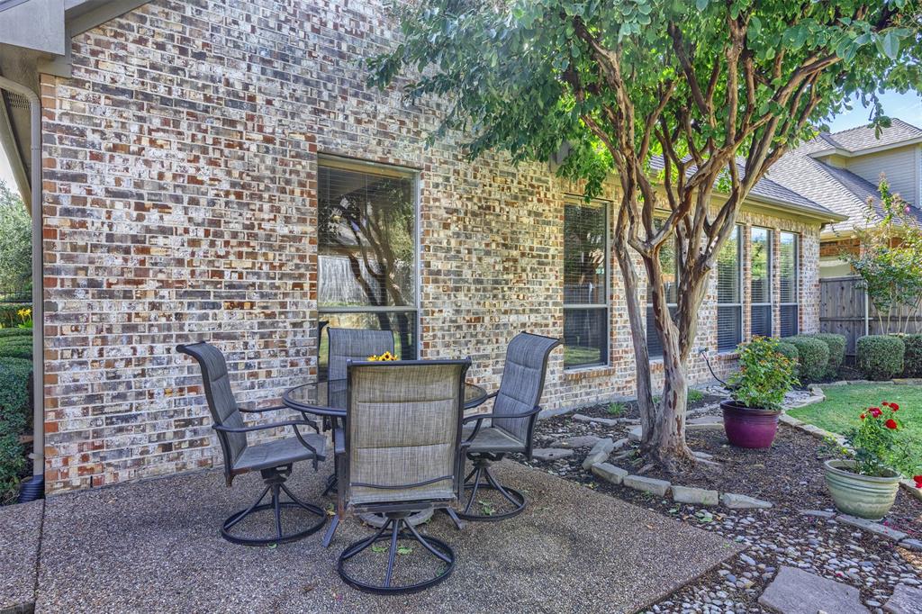 Large backyard with shaded sitting area. Large backyard with shaded sitting area.